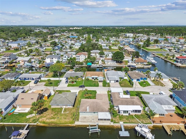 13909 Berkowitz Ave, Hudson, FL 34667 - aerial view of residential area with a nearby body of water