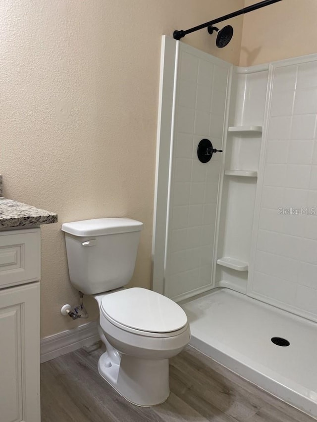 16910 SW 27th Ave, Ocala, FL 34473 - full bath with wood finished floors, a shower stall, and vanity