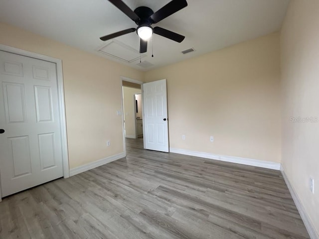 16910 SW 27th Ave, Ocala, FL 34473 - unfurnished bedroom featuring wood finished floors and a ceiling fan