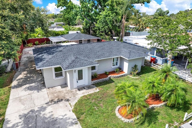 10375 106th Ter, Largo, FL 33773 - ranch-style home with a shingled roof and stucco siding