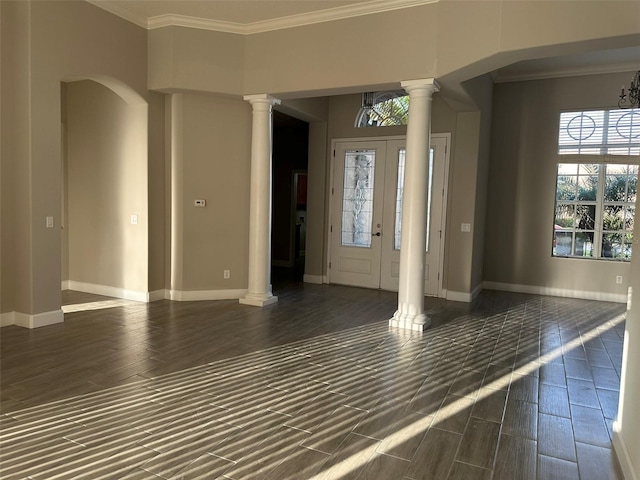 1008 Arista Blvd, Valrico, FL 33594 - entryway with decorative columns, ornamental molding, wood finished floors, and arched walkways
