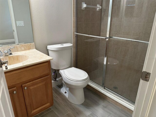 1008 Arista Blvd, Valrico, FL 33594 - bathroom featuring vanity, a tile shower, and a textured wall