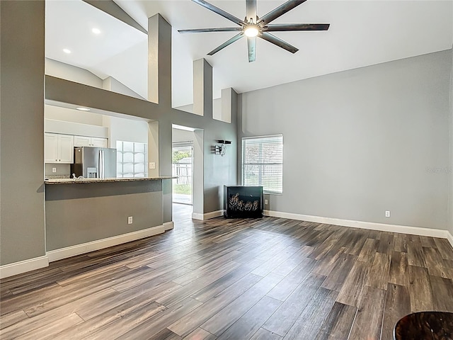 10206 Evening Trail Dr, Riverview, FL 33569 - living room featuring ceiling fan, dark wood-type flooring, high vaulted ceiling, and recessed lighting