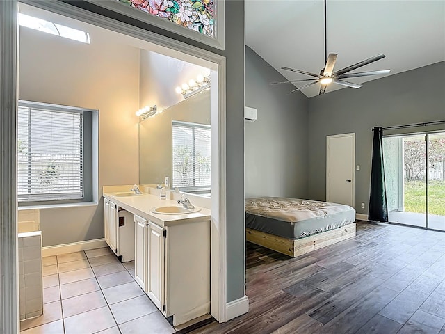 10206 Evening Trail Dr, Riverview, FL 33569 - bedroom featuring access to outside, light wood-style flooring, high vaulted ceiling, and ceiling fan