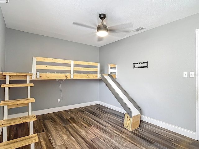 10206 Evening Trail Dr, Riverview, FL 33569 - unfurnished bedroom with dark wood-style floors and ceiling fan