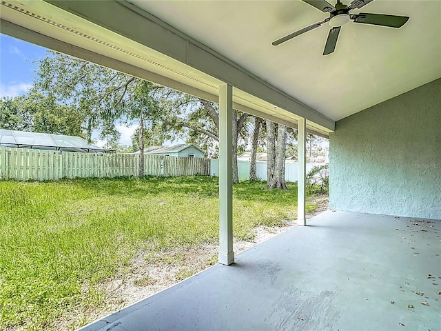 10206 Evening Trail Dr, Riverview, FL 33569 - fenced backyard with ceiling fan and a patio area