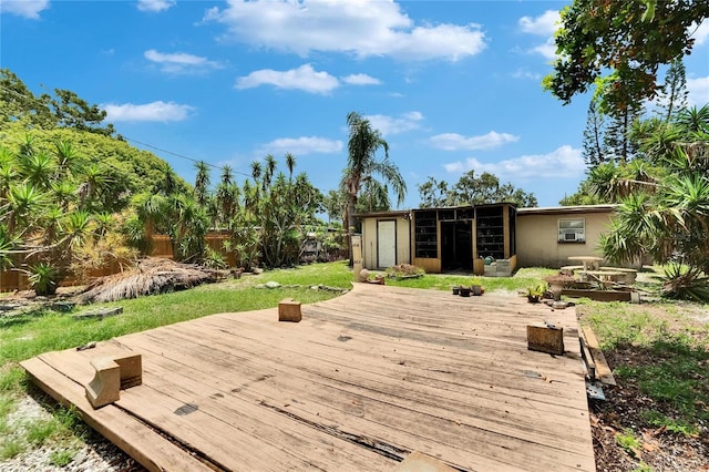 10549 112th Ave, Largo, FL 33773 - deck featuring a fenced backyard and an outdoor structure