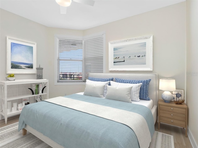 7979 Sailboat Key Blvd S Unit 505, South Pasadena, FL 33707 - bedroom featuring wood finished floors and a ceiling fan
