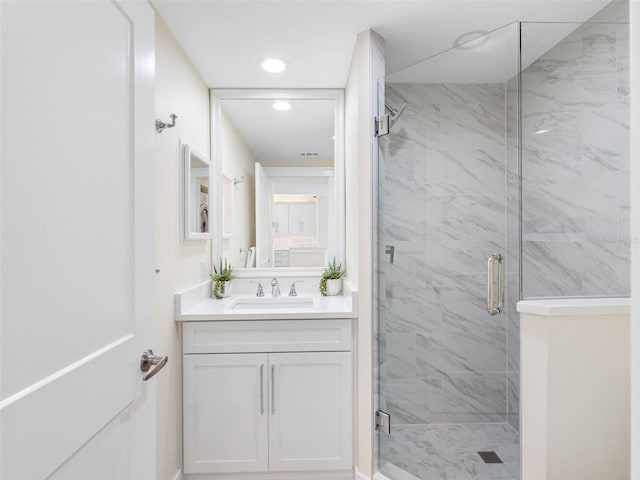 7979 Sailboat Key Blvd S Unit 505, South Pasadena, FL 33707 - full bathroom featuring vanity, a marble finish shower, and recessed lighting