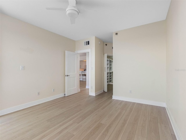 7979 Sailboat Key Blvd S Unit 505, South Pasadena, FL 33707 - unfurnished bedroom featuring light wood-style flooring and a ceiling fan