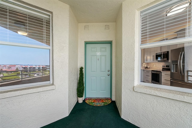 7979 Sailboat Key Blvd S Unit 505, South Pasadena, FL 33707 - entrance to property with stucco siding
