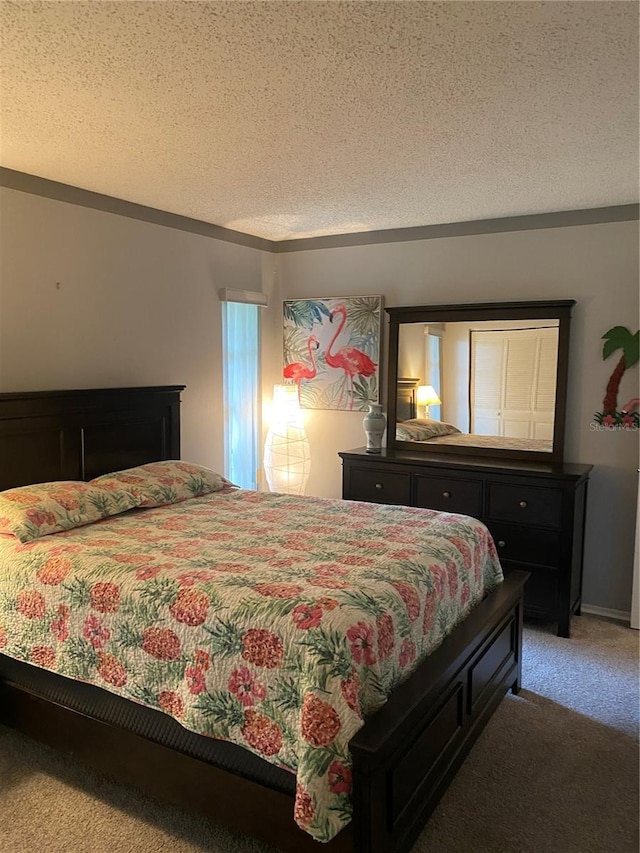 832 Cambridge Ct, Dunedin, FL 34698 - bedroom featuring a textured ceiling and light colored carpet