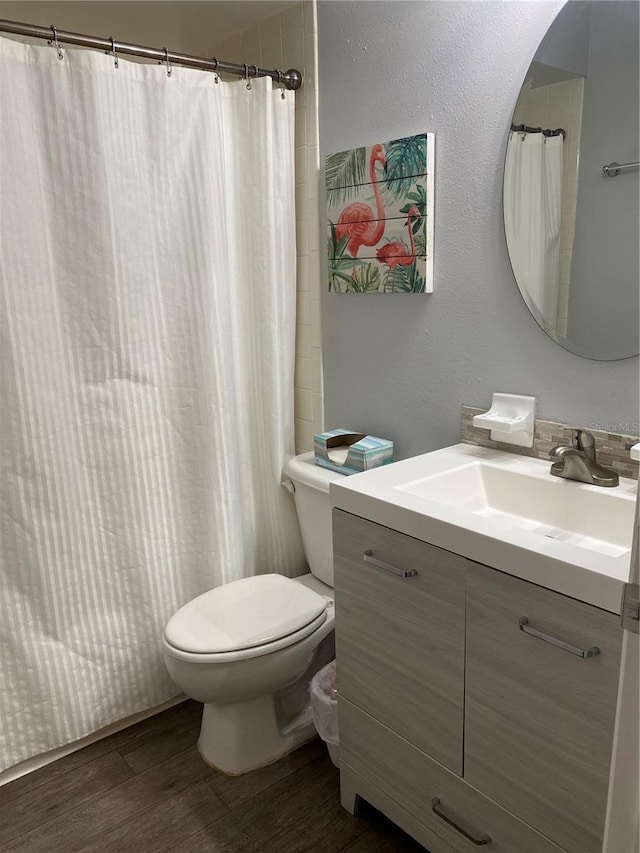832 Cambridge Ct, Dunedin, FL 34698 - bathroom with wood finished floors and vanity