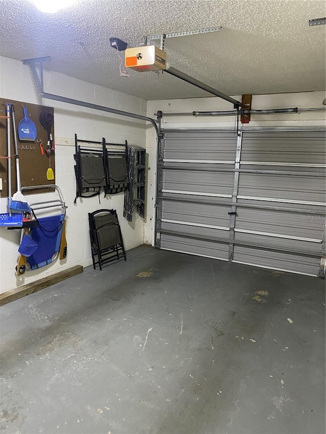 832 Cambridge Ct, Dunedin, FL 34698 - garage featuring a garage door opener