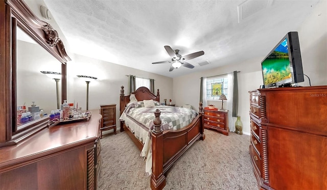 1753 Ranchette Rd, Wesley Chapel, FL 33543 - bedroom featuring light colored carpet, a ceiling fan, and a textured ceiling