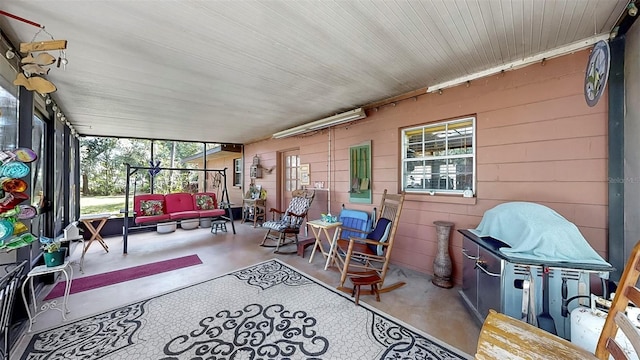 1753 Ranchette Rd, Wesley Chapel, FL 33543 - sunroom / solarium featuring an outdoor hangout area and plenty of natural light