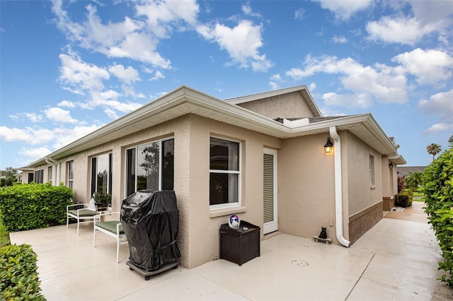 1626 Terra Ceia Bay Cir Unit 1626, Palmetto, FL 34221 - back of house featuring a patio and stucco siding