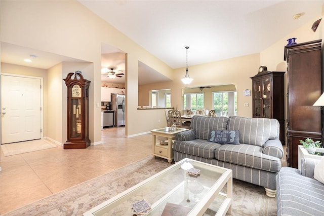 1626 Terra Ceia Bay Cir Unit 1626, Palmetto, FL 34221 - living room featuring lofted ceiling, a ceiling fan, and light tile patterned flooring