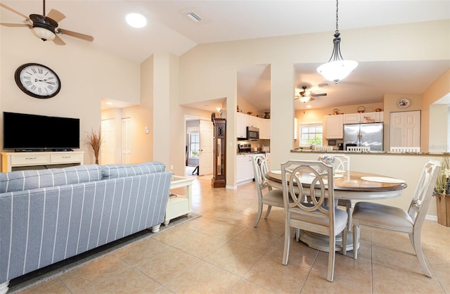 1626 Terra Ceia Bay Cir Unit 1626, Palmetto, FL 34221 - dining room with ceiling fan, lofted ceiling, and light tile patterned floors