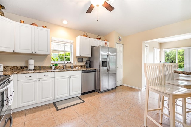 1626 Terra Ceia Bay Cir Unit 1626, Palmetto, FL 34221 - kitchen featuring stainless steel appliances, plenty of natural light, a ceiling fan, white cabinetry, and recessed lighting