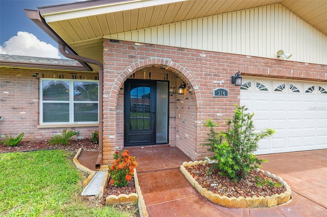 314 Circle Dr, Palm Harbor, FL 34683 - doorway to property with brick siding and an attached garage