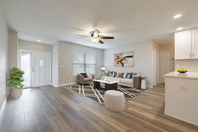 314 Circle Dr, Palm Harbor, FL 34683 - living area with recessed lighting, a ceiling fan, and light wood finished floors