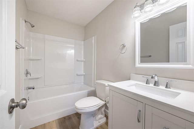 314 Circle Dr, Palm Harbor, FL 34683 - full bath with vanity, wood finished floors, and bathtub / shower combination