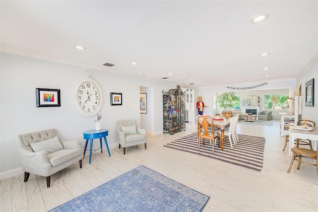 1578 Druid Rd S, Belleair, FL 33756 - living area with recessed lighting, ornamental molding, and light wood finished floors