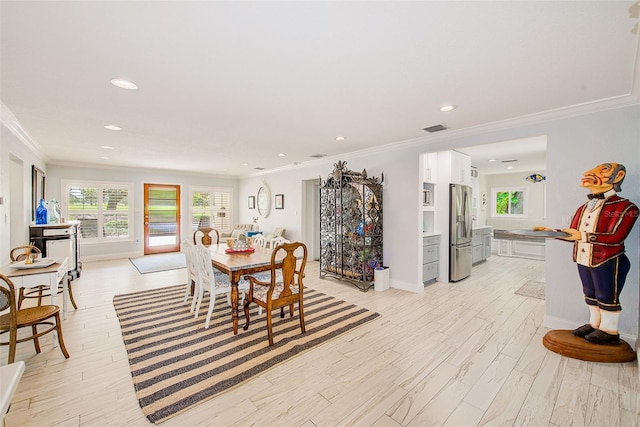 1578 Druid Rd S, Belleair, FL 33756 - dining room featuring ornamental molding, recessed lighting, and light wood-style floors