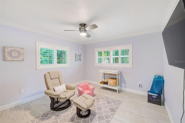 1578 Druid Rd S, Belleair, FL 33756 - sitting room with light wood finished floors, a ceiling fan, and crown molding