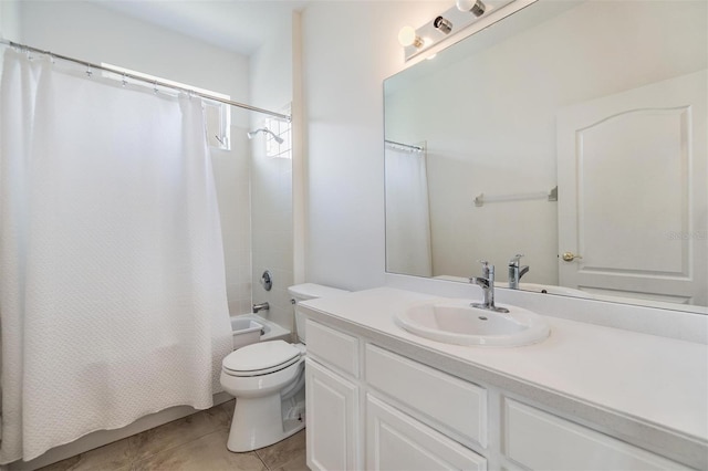 9126 Cypress Keep Ln, Odessa, FL 33556 - bathroom featuring vanity, tile patterned floors, and shower / tub combo