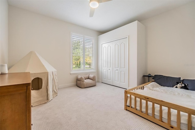 9126 Cypress Keep Ln, Odessa, FL 33556 - bedroom with a closet, carpet, and a ceiling fan