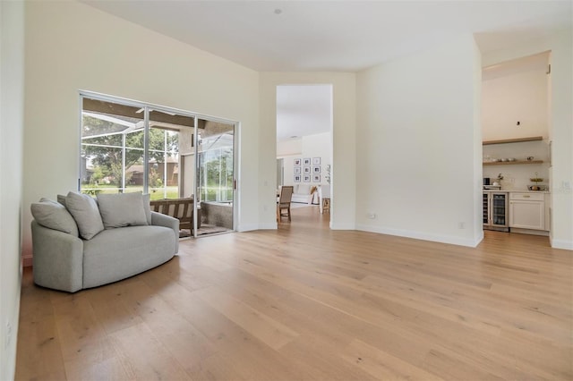 9126 Cypress Keep Ln, Odessa, FL 33556 - living area featuring light wood-type flooring and baseboards