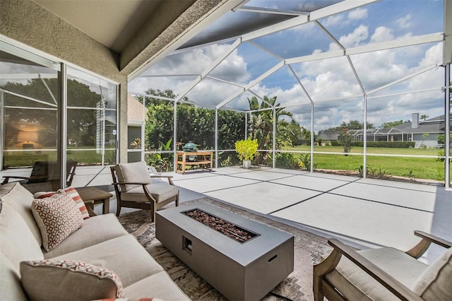 9126 Cypress Keep Ln, Odessa, FL 33556 - view of patio / terrace featuring an outdoor living space with a fire pit and a lanai