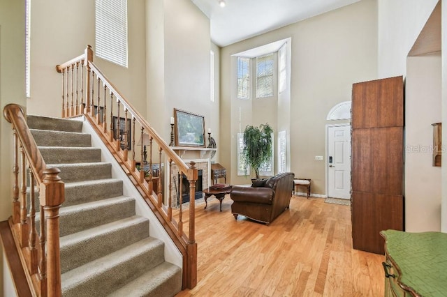 3304 W Harbor View Ave, Tampa, FL 33611 - foyer entrance featuring a towering ceiling, wood finished floors, and stairs