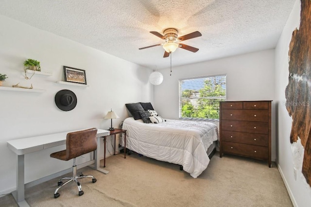 3304 W Harbor View Ave, Tampa, FL 33611 - bedroom with a textured ceiling, light carpet, and ceiling fan