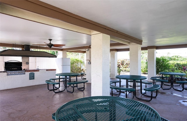 7941 58th Ave N Unit 301, Saint Petersburg, FL 33709 - view of patio / terrace with outdoor dining space, area for grilling, and ceiling fan