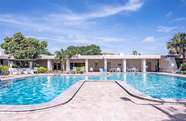 7941 58th Ave N Unit 301, Saint Petersburg, FL 33709 - community pool with a patio