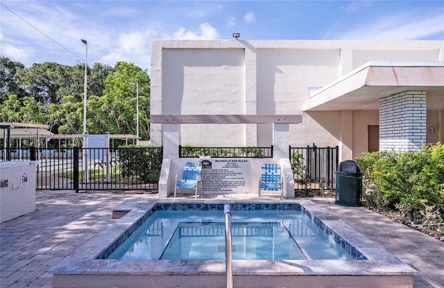 7941 58th Ave N Unit 301, Saint Petersburg, FL 33709 - view of pool with a swimming pool and a community hot tub