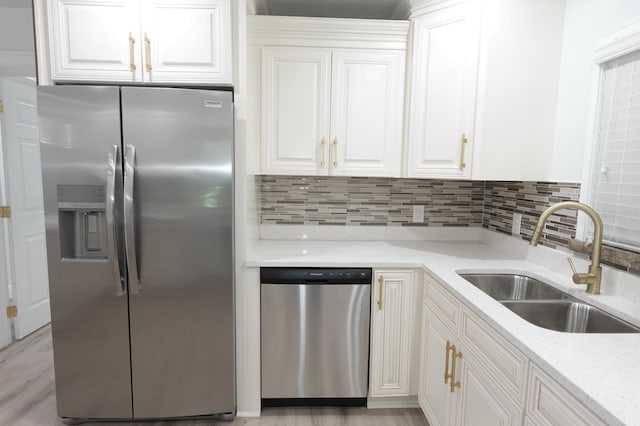 814 W 131st Ave, Tampa, FL 33612 - kitchen with appliances with stainless steel finishes and white cabinetry