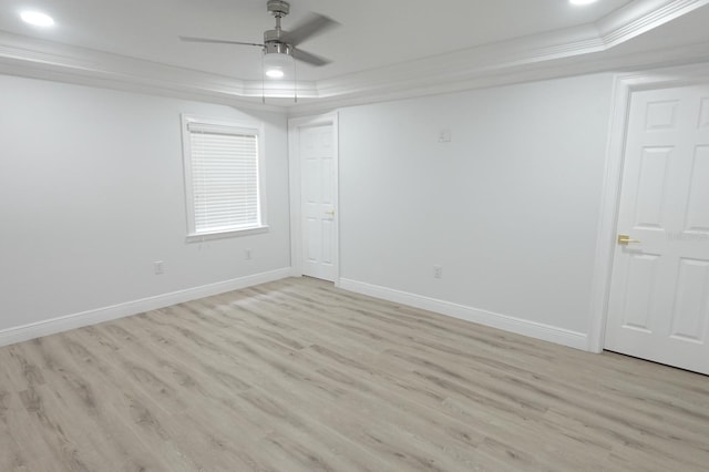 814 W 131st Ave, Tampa, FL 33612 - empty room with a raised ceiling, a ceiling fan, light wood finished floors, ornamental molding, and recessed lighting
