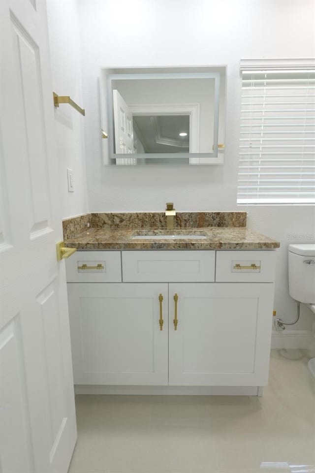 814 W 131st Ave, Tampa, FL 33612 - bathroom with toilet and vanity