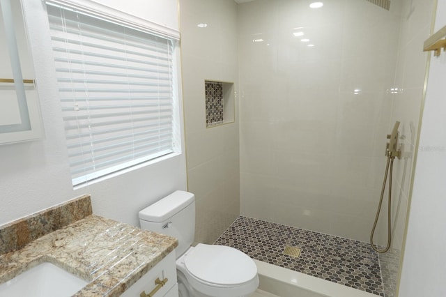 814 W 131st Ave, Tampa, FL 33612 - bathroom featuring vanity and a tile shower