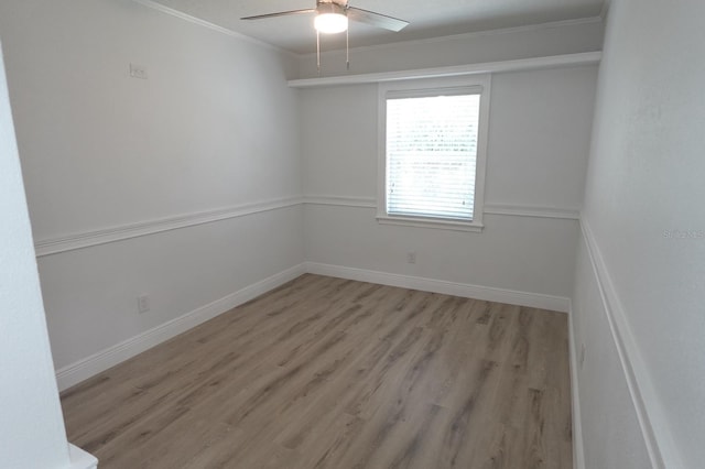 814 W 131st Ave, Tampa, FL 33612 - empty room with light wood-style flooring, ceiling fan, and ornamental molding