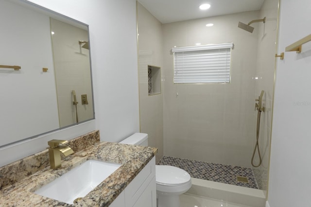 814 W 131st Ave, Tampa, FL 33612 - full bathroom with vanity, a tile shower, and recessed lighting