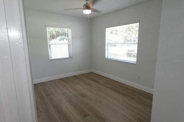 814 W 131st Ave, Tampa, FL 33612 - empty room with wood finished floors and a ceiling fan