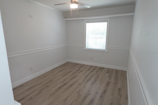 814 W 131st Ave, Tampa, FL 33612 - spare room featuring light wood-style flooring, a ceiling fan, and crown molding