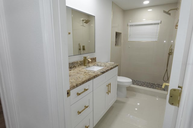 814 W 131st Ave, Tampa, FL 33612 - bathroom featuring vanity, tiled shower, and recessed lighting