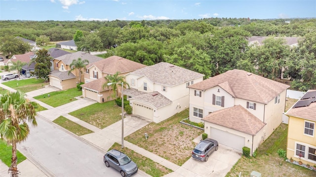 16828 N Gold Star Ct, Clermont, FL 34714 - aerial perspective of suburban area with a heavily wooded area