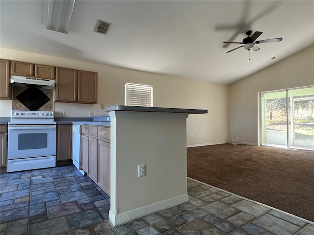 103 Thornbush Pkwy, Davenport, FL 33837 - kitchen with white appliances, stone finish floors, a ceiling fan, lofted ceiling, and open floor plan